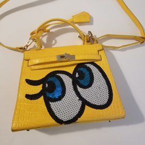 Play No More yellow "shy girl' bag